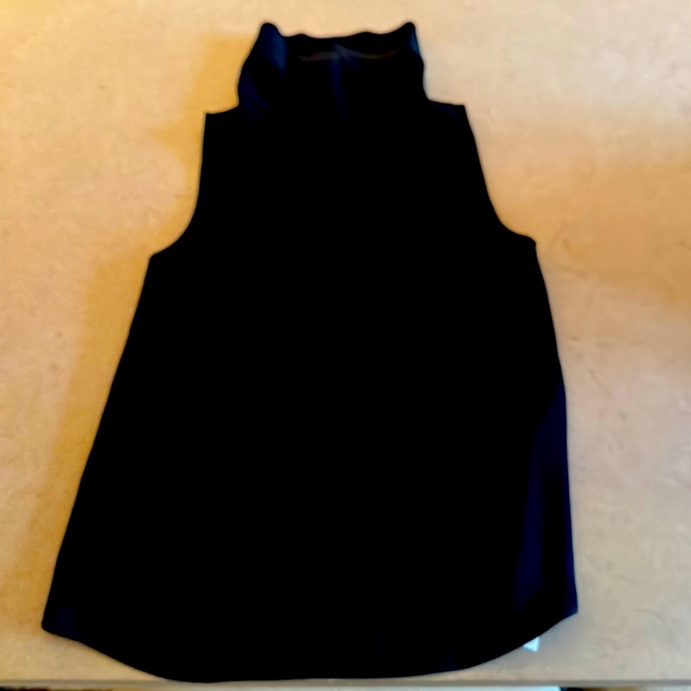 Theory black sleeveless top with buttons on the back.